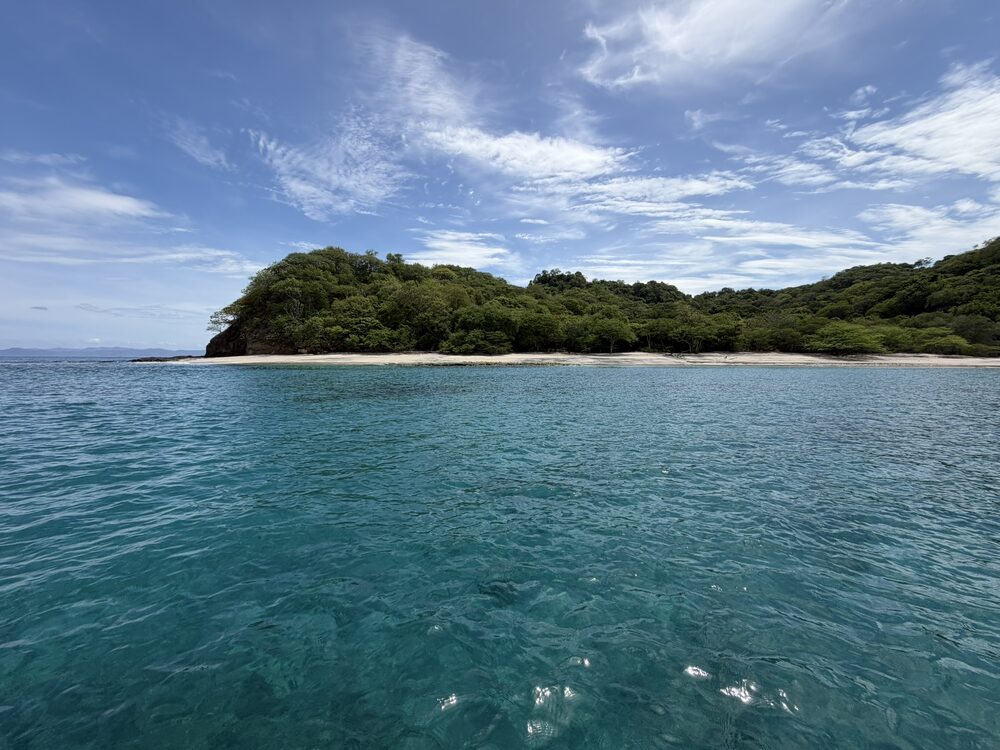 A hidden white-sand beach and turquoise water in the Gulf of Papagayo, Costa Rica